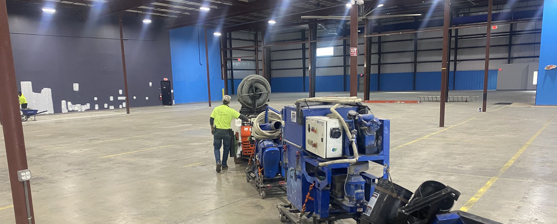 Two Durer Blastrac shot blasting machines on a commercial concrete project